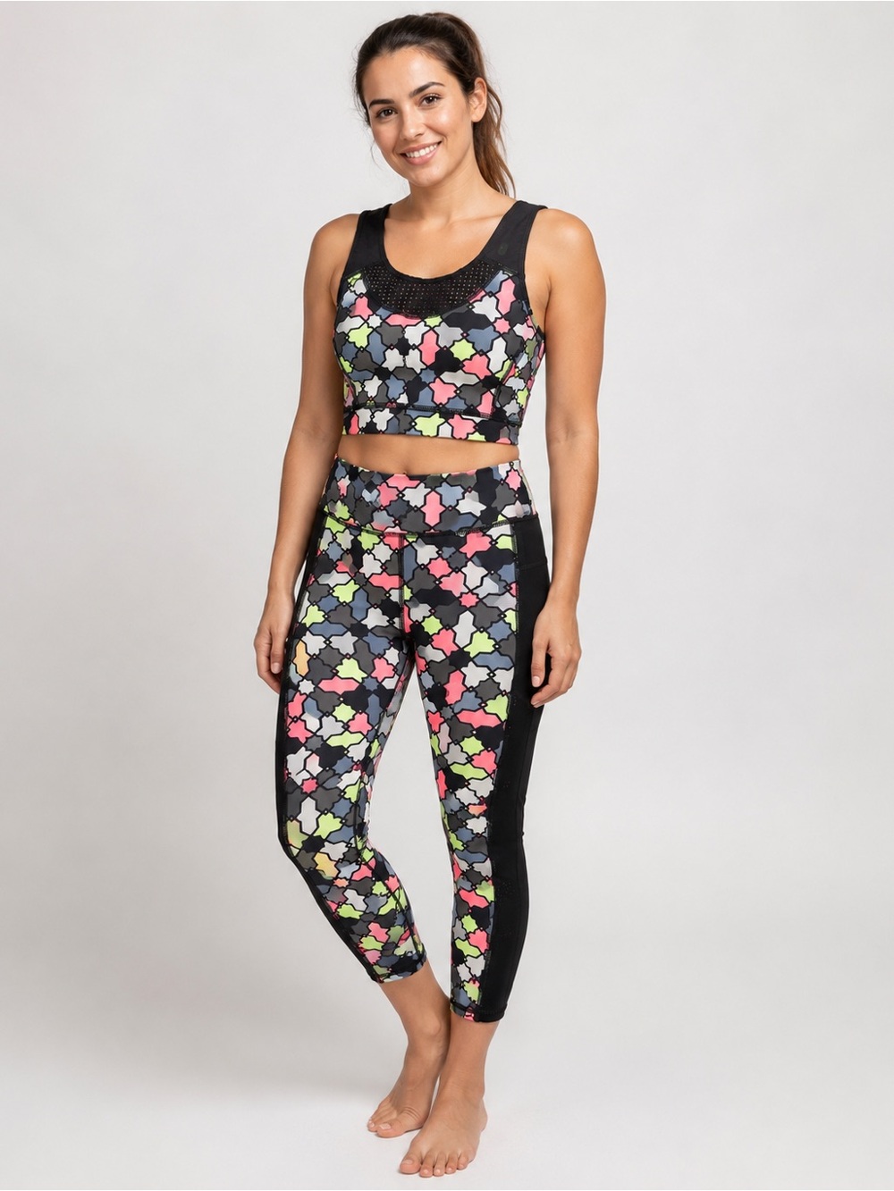 Sweaty Betty Black Leggings and Crop Top Set with Neon Pink and Lime Pattern